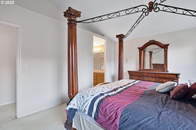 1545 NE Gertz Rd, Portland, OR 97211 - bedroom featuring vaulted ceiling, light carpet, ensuite bath, decorative columns, and baseboards