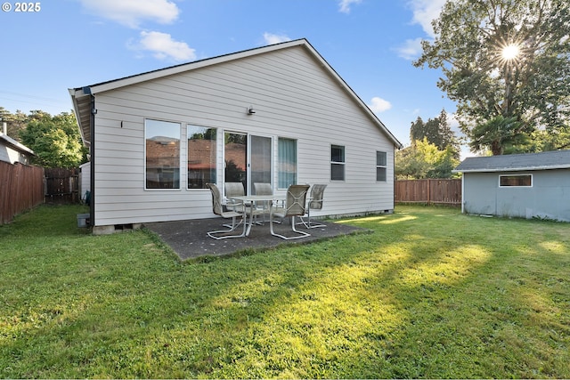 1545 NE Gertz Rd, Portland, OR 97211 - rear view of house featuring a patio area