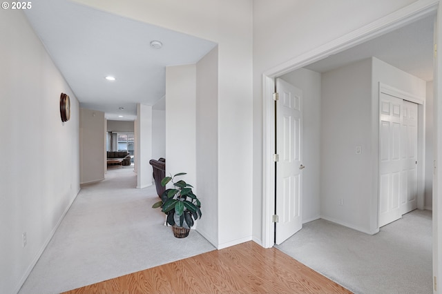 1545 NE Gertz Rd, Portland, OR 97211 - corridor with carpet flooring, recessed lighting, baseboards, and wood finished floors