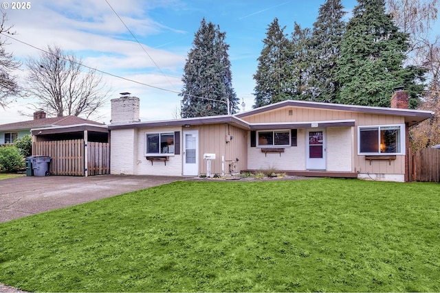 ranch-style house with a front lawn