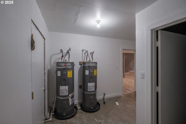 640 8th St, Astoria, OR 97103 - utility room featuring secured water heater
