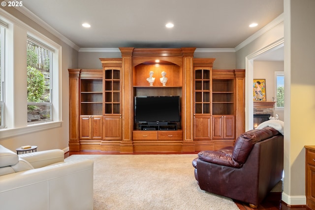 14079 SE Alta Vista Dr, Happy Valley, OR 97086 - living area featuring crown molding, carpet floors, recessed lighting, and a warm lit fireplace