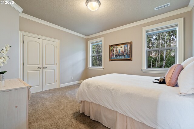 14079 SE Alta Vista Dr, Happy Valley, OR 97086 - bedroom featuring light carpet, visible vents, a textured ceiling, and crown molding