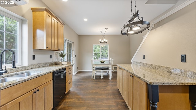 87951 Blazer Ln, Bandon, OR 97411 - kitchen featuring black dishwasher, dark wood-style flooring, a chandelier, recessed lighting, and light stone countertops