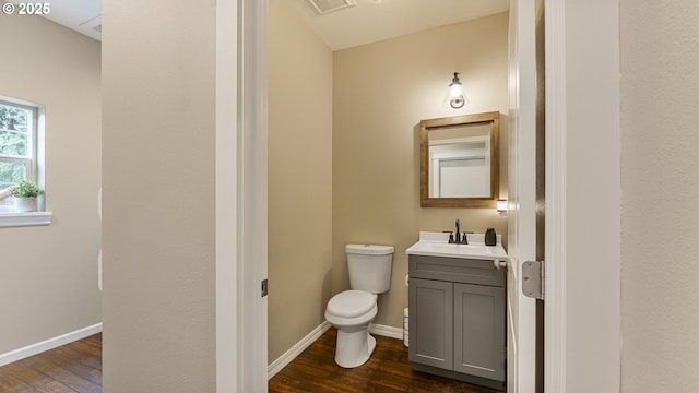 87951 Blazer Ln, Bandon, OR 97411 - bathroom featuring hardwood / wood-style floors and vanity