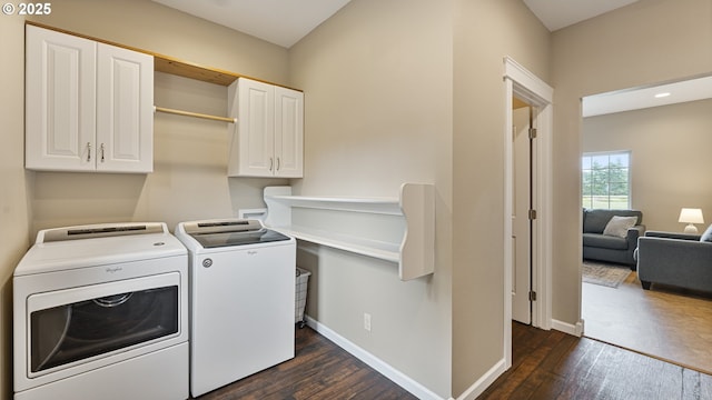 87951 Blazer Ln, Bandon, OR 97411 - laundry room featuring cabinet space, separate washer and dryer, dark wood-style flooring, and recessed lighting