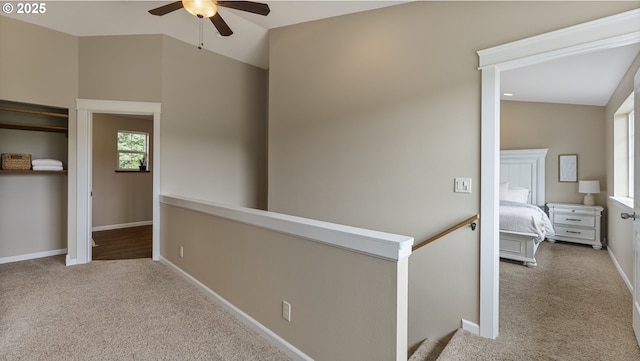87951 Blazer Ln, Bandon, OR 97411 - corridor with carpet and an upstairs landing