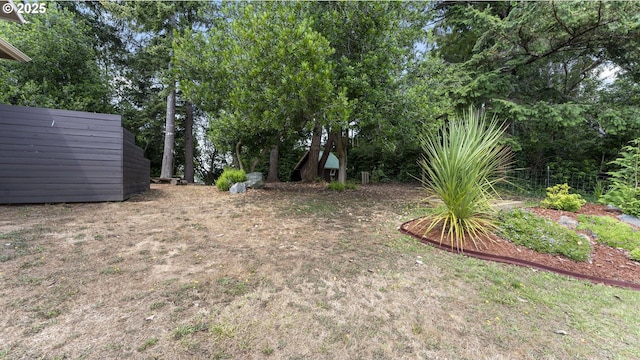 87951 Blazer Ln, Bandon, OR 97411 - view of yard with view of wooded area