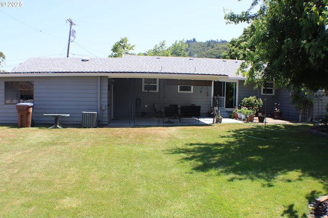 131 Mountain View Ave, Myrtle Creek, OR 97457 - rear view of house with a patio and a lawn