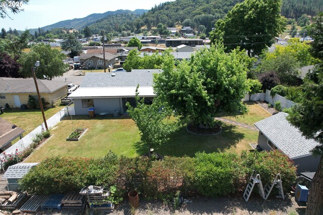 131 Mountain View Ave, Myrtle Creek, OR 97457 - aerial perspective of suburban area with a mountain backdrop