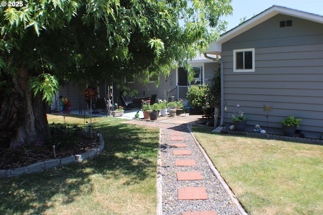 131 Mountain View Ave, Myrtle Creek, OR 97457 - view of green lawn featuring a patio area