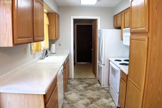 131 Mountain View Ave, Myrtle Creek, OR 97457 - kitchen featuring white appliances, light countertops, and brown cabinets