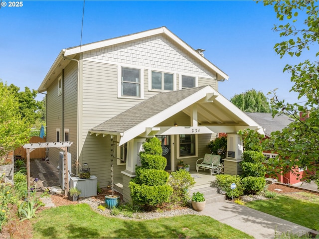 224 NE 44th Ave, Portland, OR 97213 - back of property with covered porch and roof with shingles