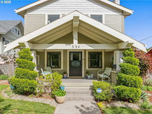 224 NE 44th Ave, Portland, OR 97213 - entrance to property featuring a porch and a chimney
