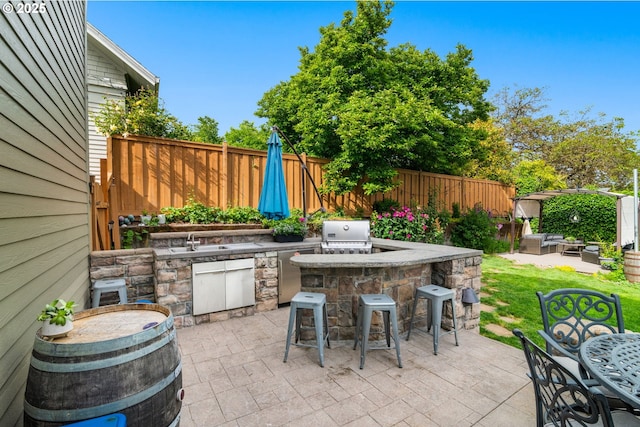224 NE 44th Ave, Portland, OR 97213 - fenced backyard featuring a patio and an outdoor hangout area