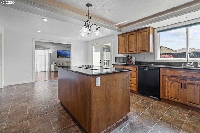 kitchen with a center island, a textured ceiling, black appliances, and dark countertops