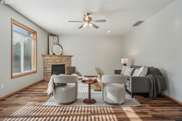 812 NW 13th Ave, Battle Ground, WA 98604 - living area featuring wood finished floors, a ceiling fan, a fireplace, baseboards, and recessed lighting