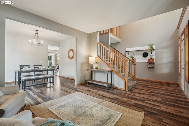 812 NW 13th Ave, Battle Ground, WA 98604 - living room featuring a chandelier, wood finished floors, stairs, and baseboards