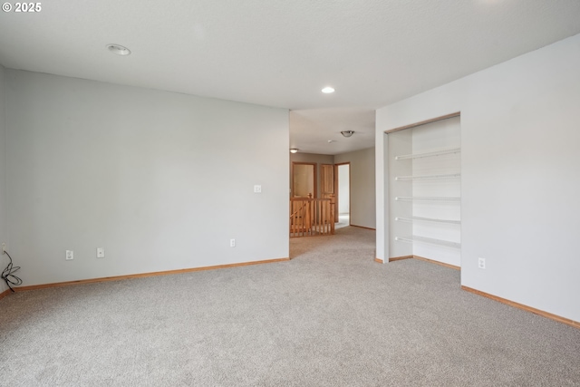 812 NW 13th Ave, Battle Ground, WA 98604 - carpeted spare room with baseboards and recessed lighting