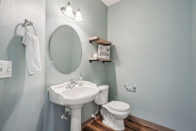 812 NW 13th Ave, Battle Ground, WA 98604 - half bath with wood finished floors, baseboards, and toilet