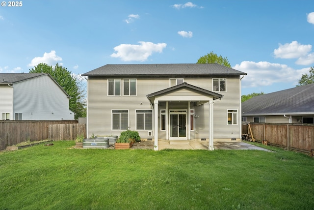 812 NW 13th Ave, Battle Ground, WA 98604 - back of house featuring a patio and a vegetable garden