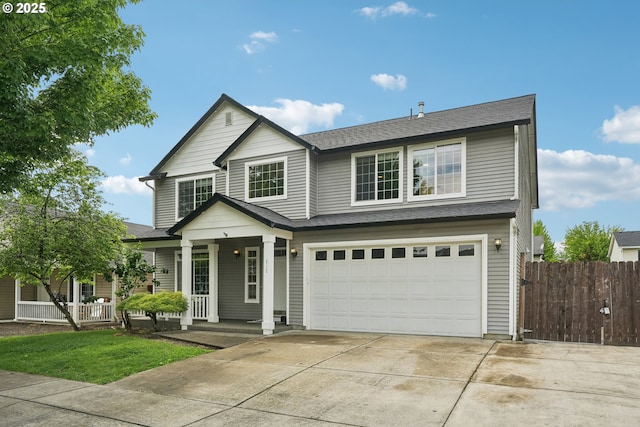 812 NW 13th Ave, Battle Ground, WA 98604 - view of front of home featuring a porch, driveway, and a garage
