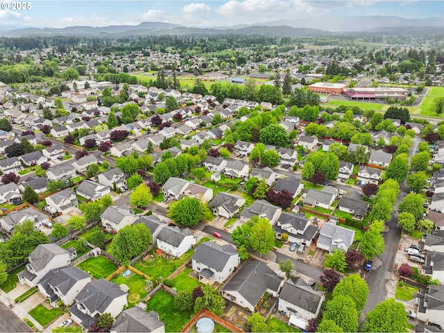 812 NW 13th Ave, Battle Ground, WA 98604 - aerial perspective of suburban area featuring mountains and property parcel outlined