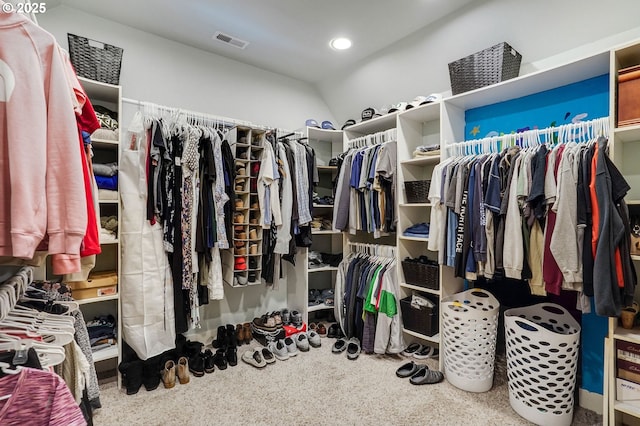 walk in closet with visible vents