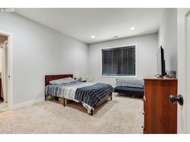 carpeted bedroom featuring recessed lighting, baseboards, and visible vents