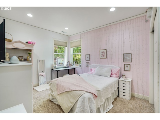 bedroom with light carpet, recessed lighting, and visible vents