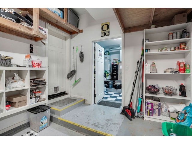 storage room with strapped water heater
