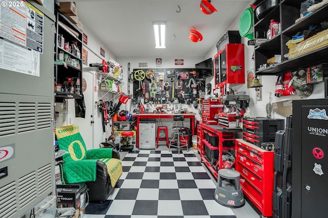 garage with a workshop area