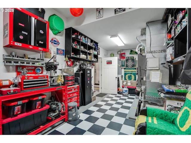 garage with a workshop area
