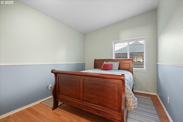 bedroom featuring hardwood / wood-style floors