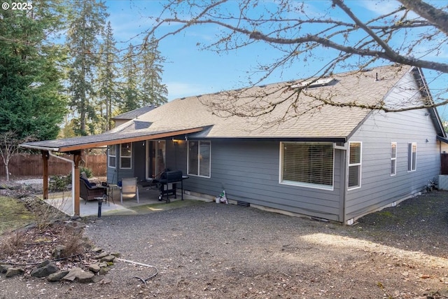 back of house featuring a patio