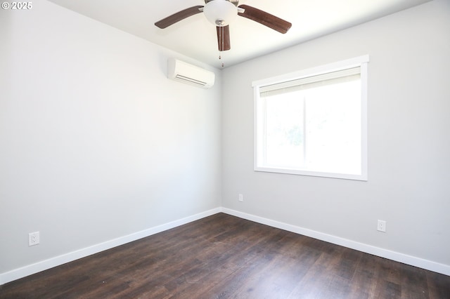 116 W J St, Springfield, OR 97477 - spare room featuring a wall unit AC, dark wood-style floors, and ceiling fan