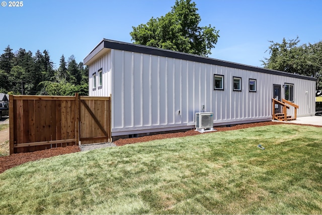 116 W J St, Springfield, OR 97477 - rear view of property featuring board and batten siding