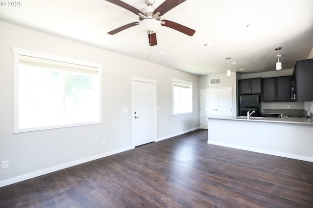 116 W J St, Springfield, OR 97477 - unfurnished living room featuring a ceiling fan, dark wood-style flooring, and recessed lighting