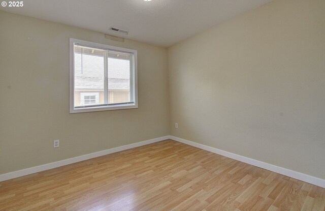 10808 NE 92nd Cir, Vancouver, WA 98662 - unfurnished room with light wood-style flooring and baseboards