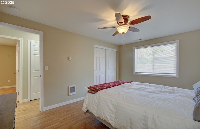 10808 NE 92nd Cir, Vancouver, WA 98662 - bedroom featuring light wood-style floors, a closet, a ceiling fan, and heating unit