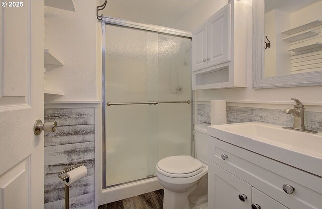 10808 NE 92nd Cir, Vancouver, WA 98662 - full bathroom featuring vanity, a stall shower, and wood finished floors