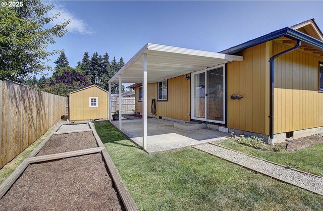 10808 NE 92nd Cir, Vancouver, WA 98662 - back of property featuring a storage unit, a fenced backyard, and a patio