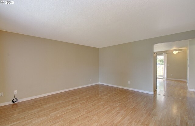 10808 NE 92nd Cir, Vancouver, WA 98662 - empty room featuring light wood-style flooring and baseboards
