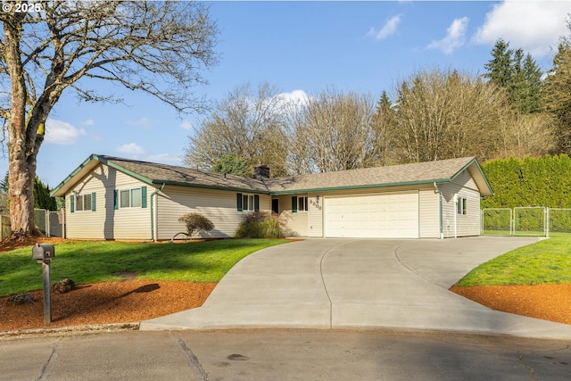 ranch-style house with fence, driveway, a gate, and a garage