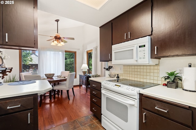 14935 NE Sacramento St Unit 28, Portland, OR 97230 - kitchen featuring white appliances, ceiling fan, light countertops, and decorative backsplash