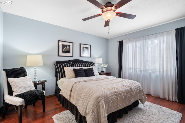 14935 NE Sacramento St Unit 28, Portland, OR 97230 - bedroom featuring wood finished floors and a ceiling fan