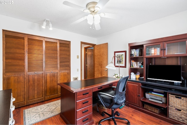 14935 NE Sacramento St Unit 28, Portland, OR 97230 - home office with wood finished floors and ceiling fan