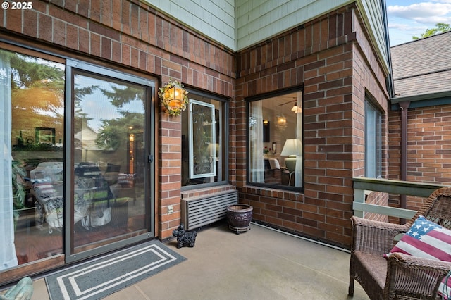 14935 NE Sacramento St Unit 28, Portland, OR 97230 - entrance to property featuring brick siding and roof with shingles