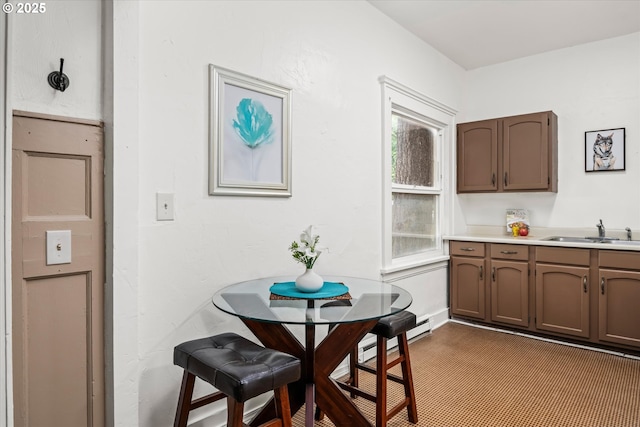561 Madison St, Eugene, OR 97402 - dining space with a baseboard radiator