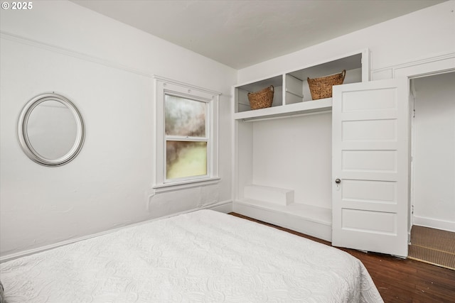 561 Madison St, Eugene, OR 97402 - bedroom with dark wood finished floors